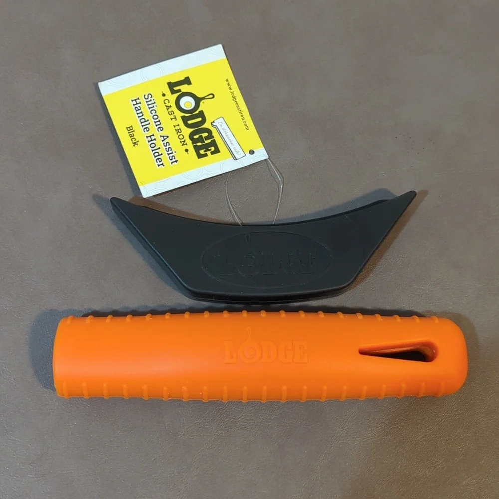 Silicone Lodge cast iron orange hot handle holder and blk assist handle holder